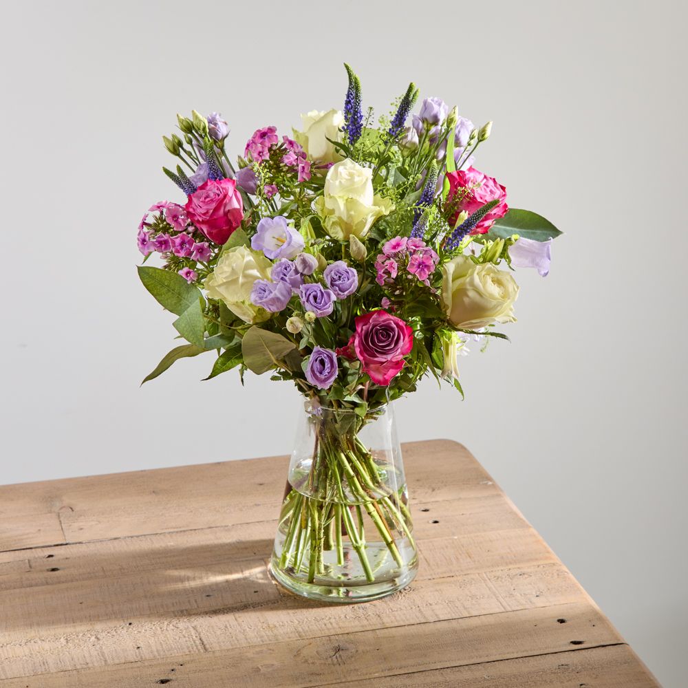 White Roses, Deep Purple Roses, Pink Phlox, Lilac Lisianthus, Veronica Spray Purple, Lilac Campanula, Robusta and Greenbell