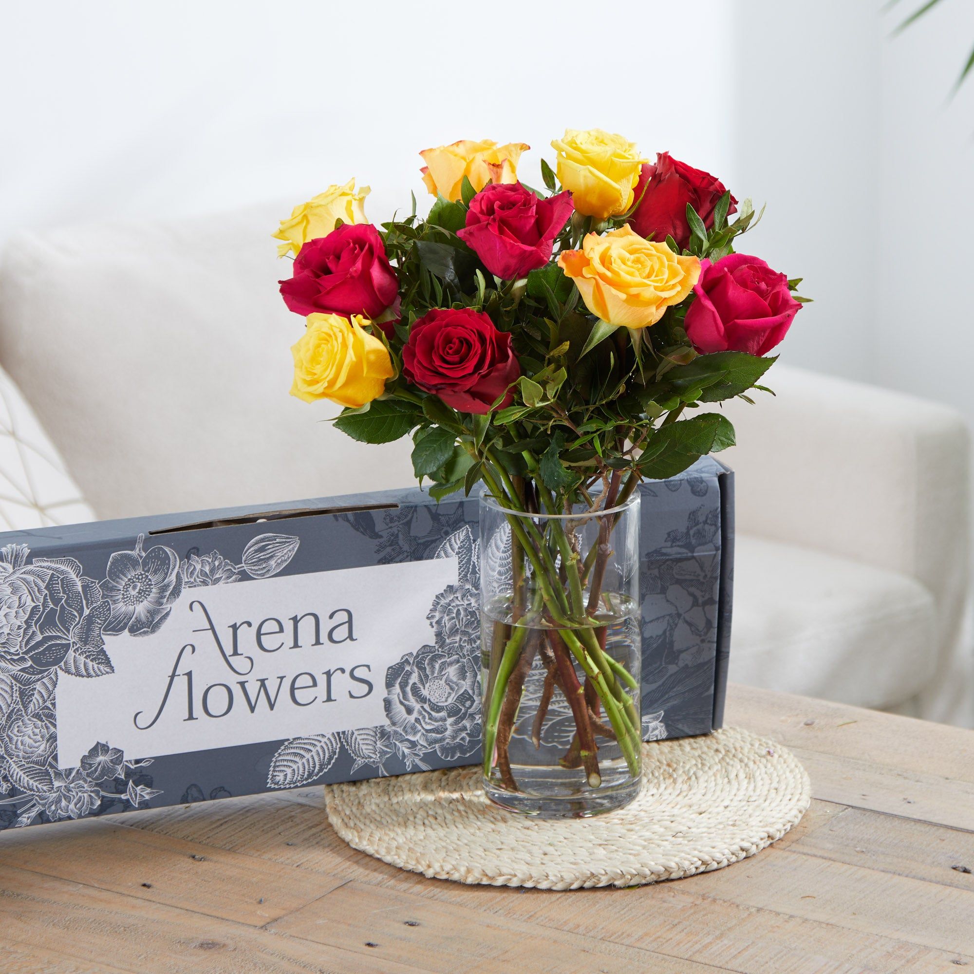 Send letterbox yellow, red and orange roses | Arena Flowers