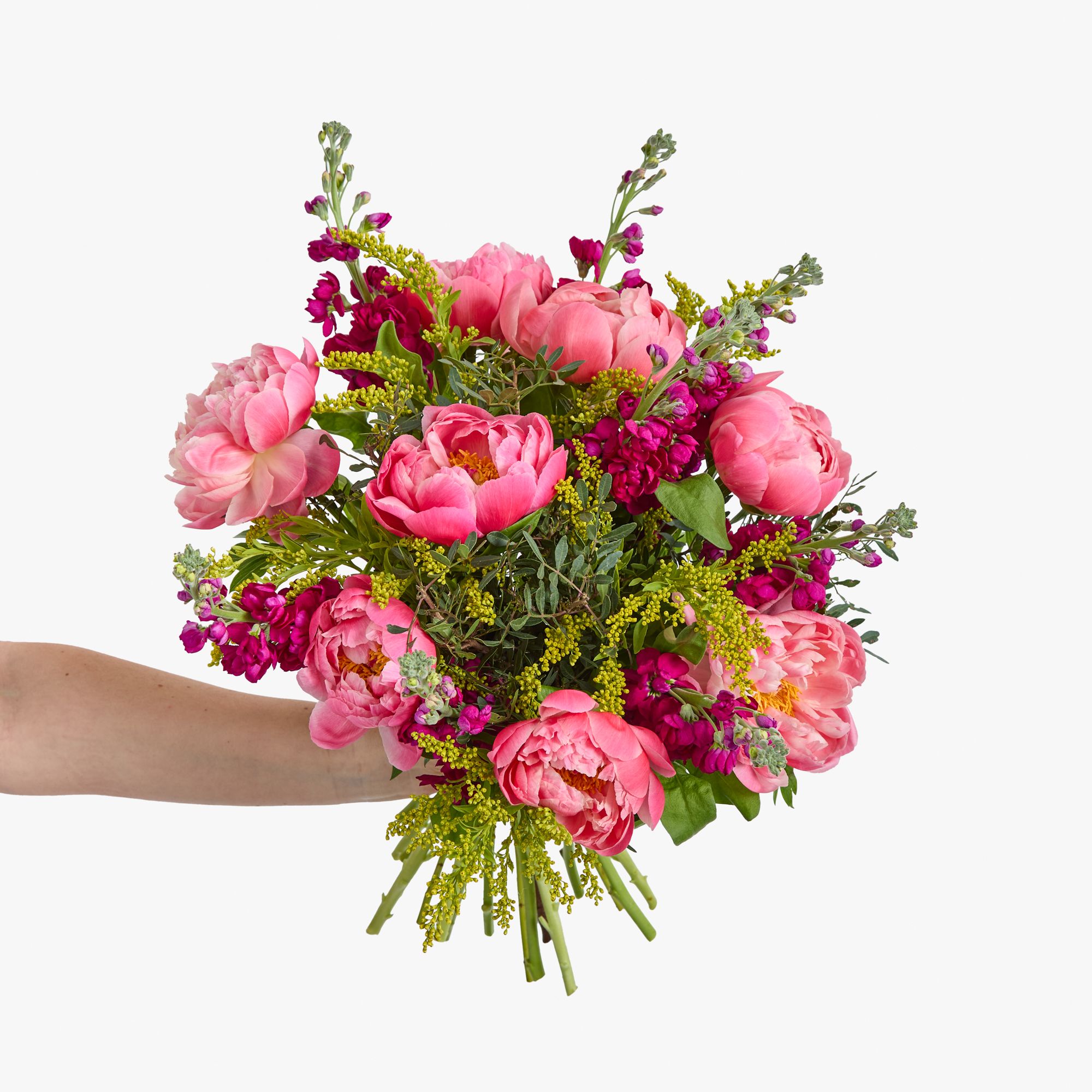 Coral peonies, red stocks, solidago and pistache