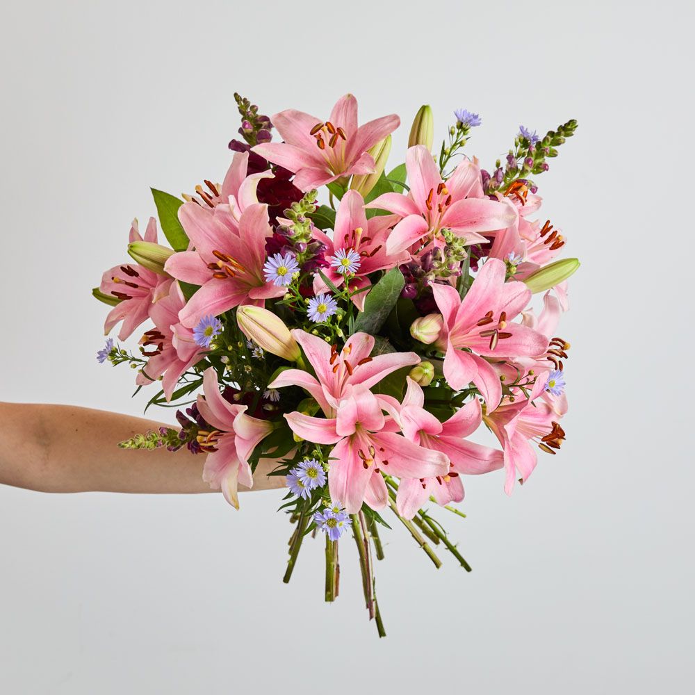 Lilies, antirrhinum, asters and eucalyptus robusta
