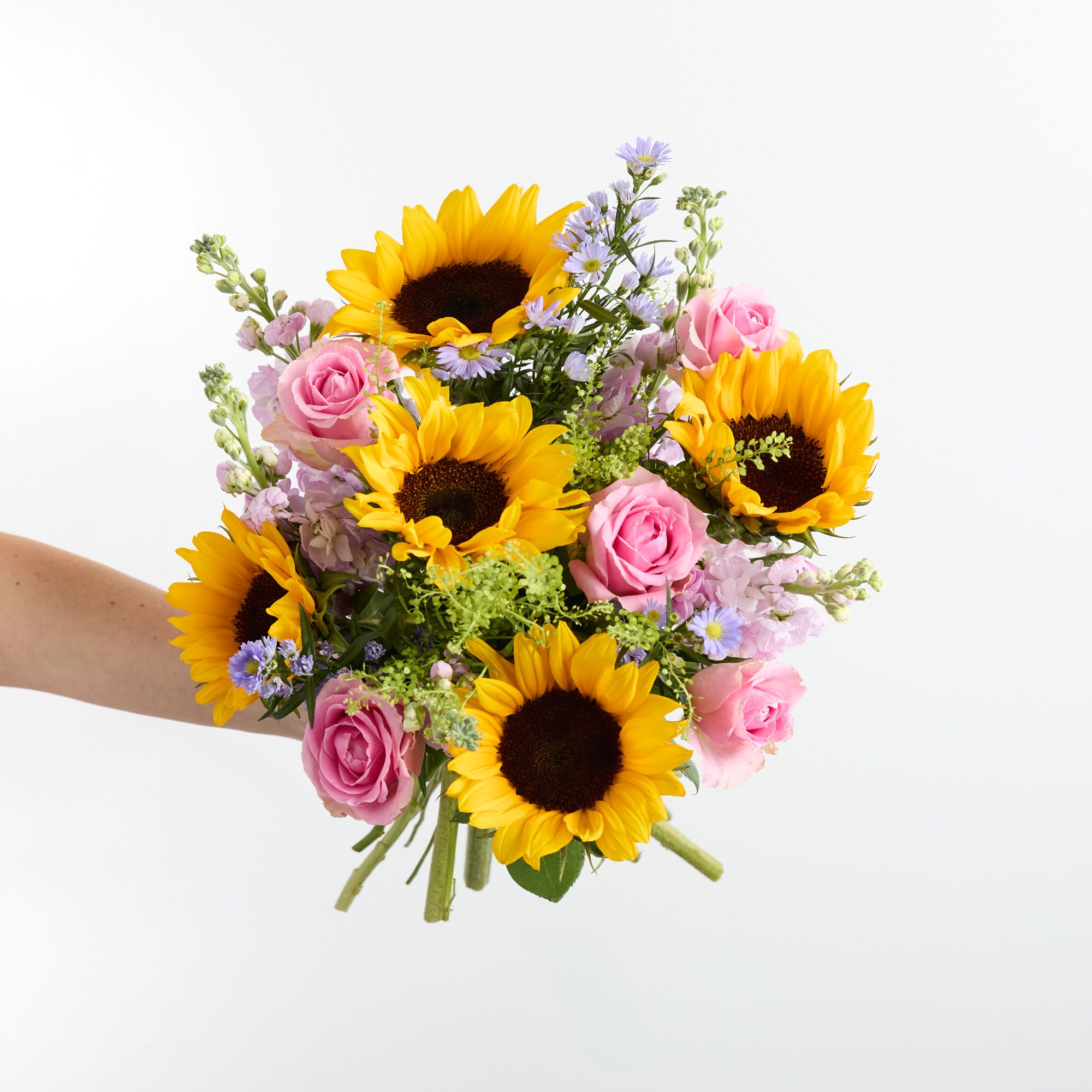Sunflowers, asters, stocks, roses and greenbell