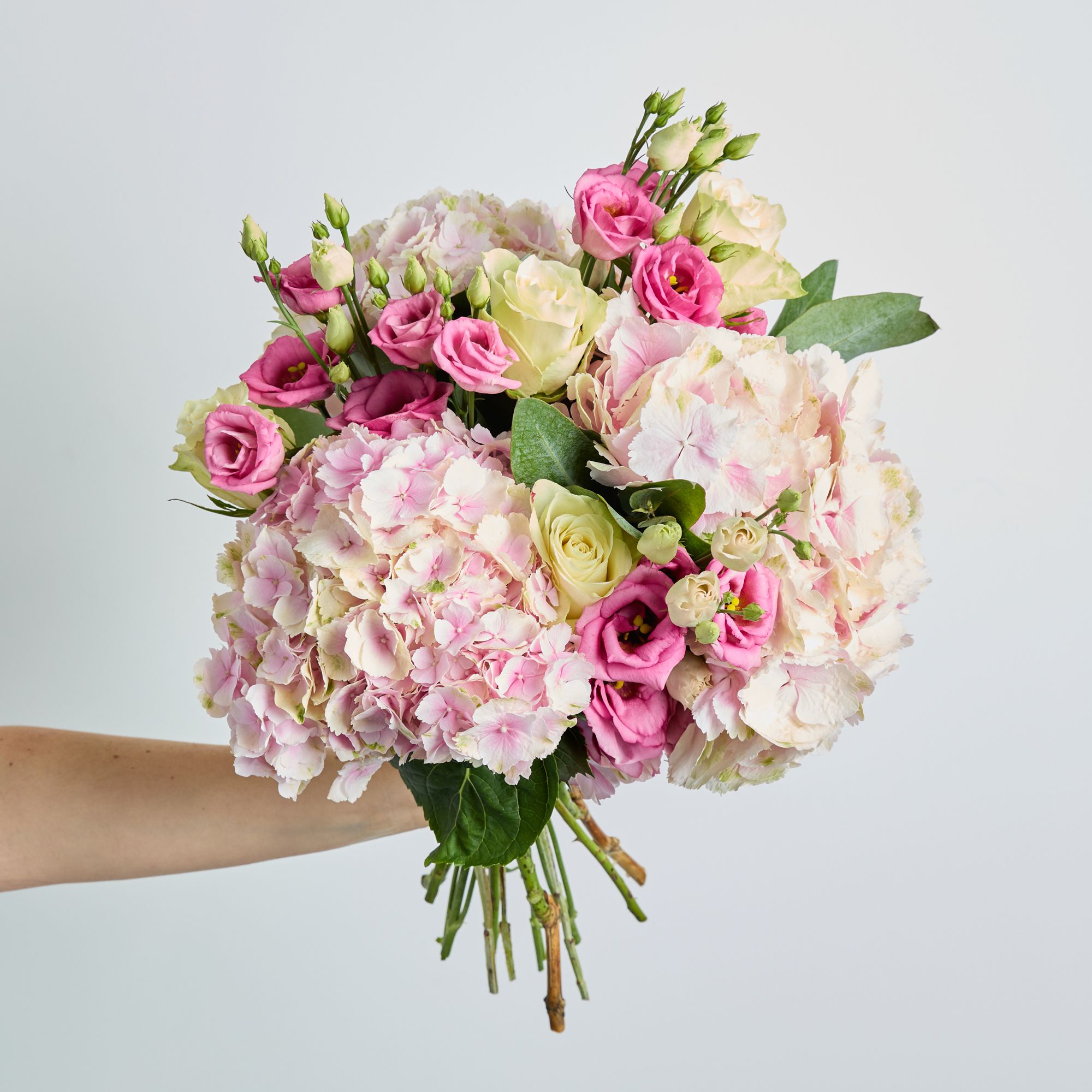 Hydrangeas, roses, lisianthus and eucalyptus robusta