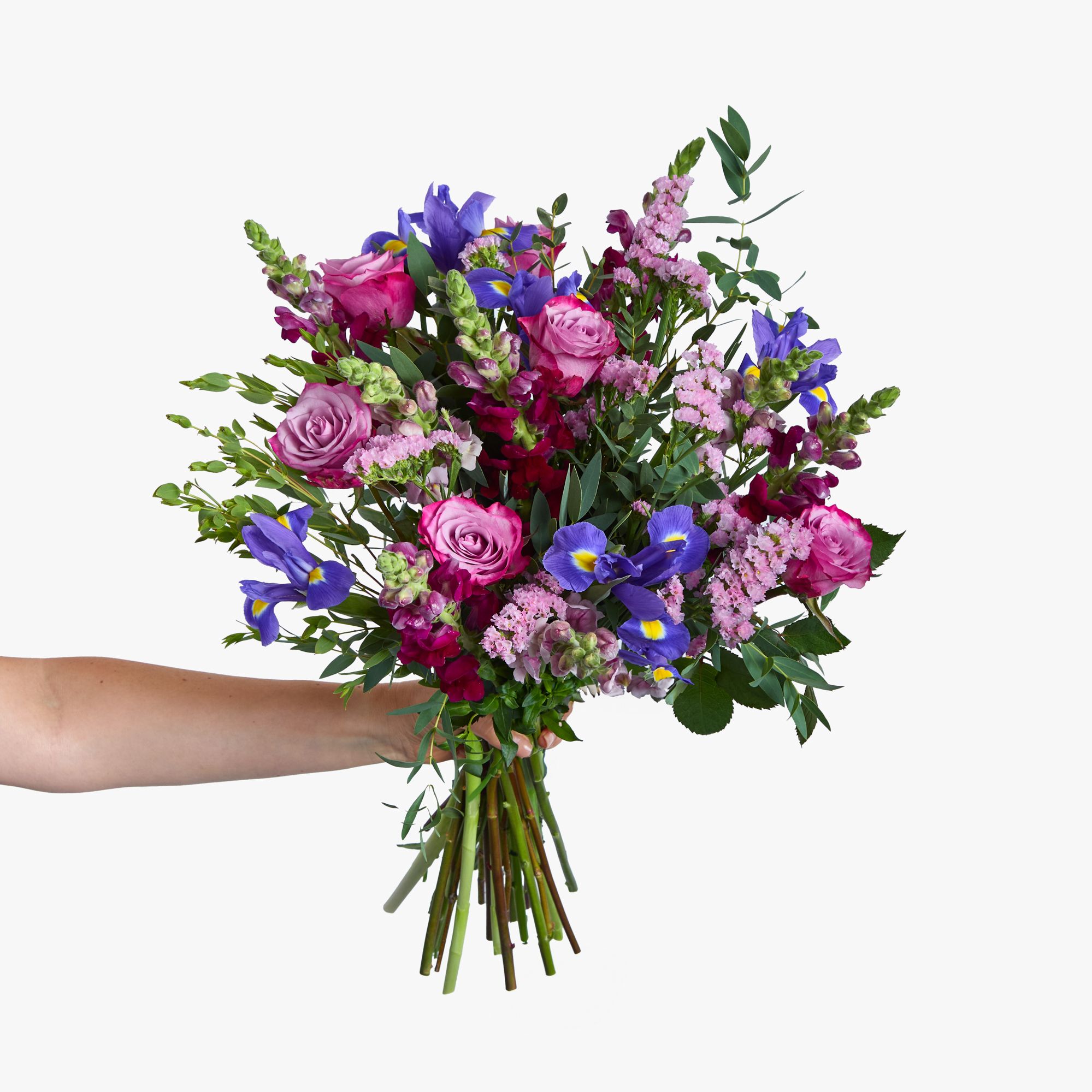 Irises, rose 'Deep Purple', pink statice, red antirrhinum, lavender antirrhinum, eucalyptus parvifolia