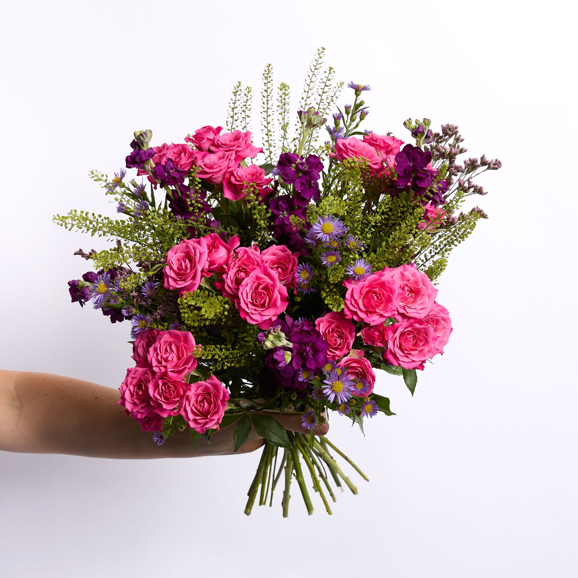 Spray roses, stocks, asters, limonium and greenbell