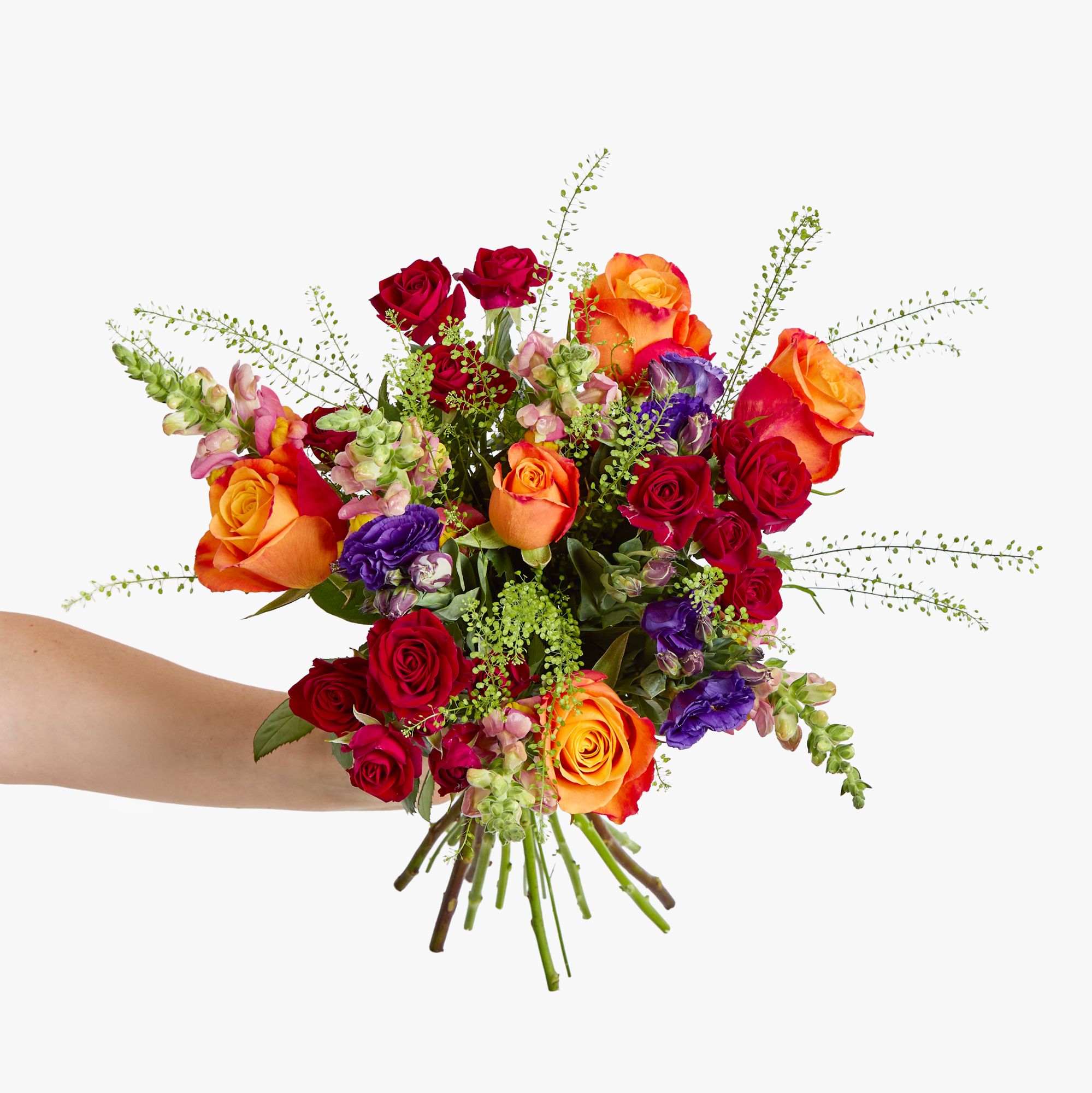 Orange 'Confidential' roses, red spray roses, purple lisianthus, antirrhinum and greenbell