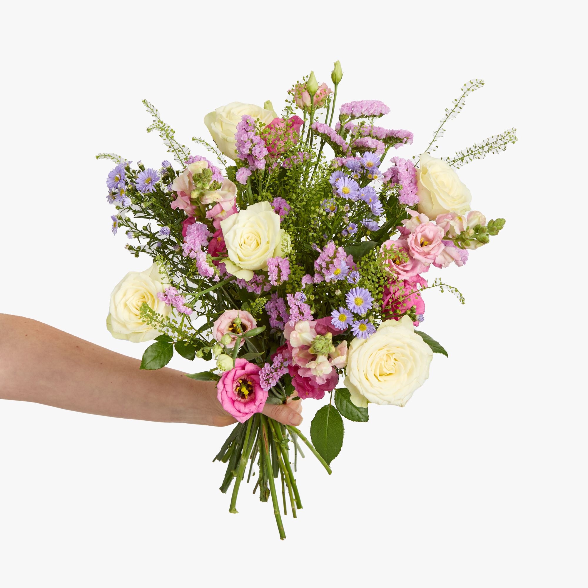White roses, pink lisianthus, pink statice, pink antirrhinum, lilac asters and greenbell